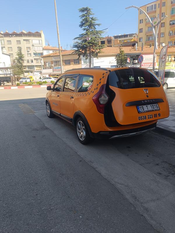 Sungurlu Taksi, 19T1016 plakalı sarı  Dacia  Lody  - Fotoğraf 4