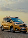 Midyat Taksi, 47T3033 plakalı beyaz Ford Courier - Fotoğraf 4